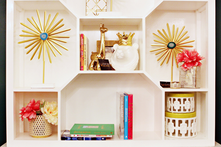 A shelf with different decor arranged by Southfork